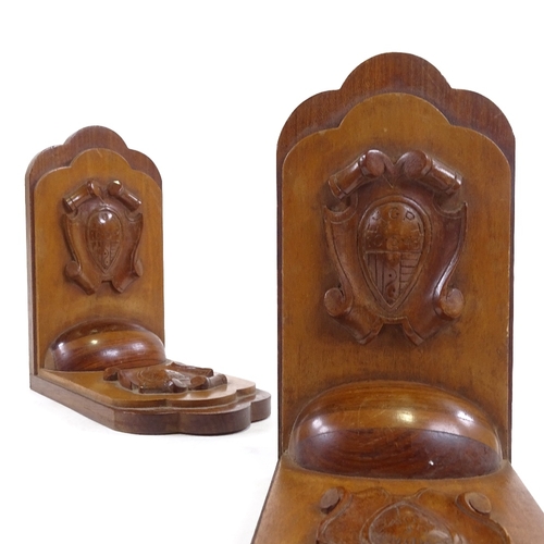 199 - A pair of WWII period bookends, carved hardwood, plaques read 