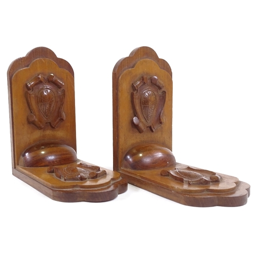 199 - A pair of WWII period bookends, carved hardwood, plaques read 