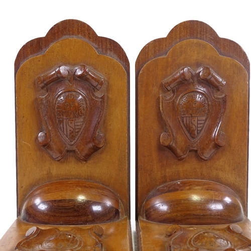 199 - A pair of WWII period bookends, carved hardwood, plaques read 