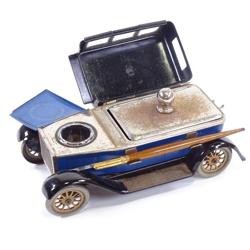 2 - MOTORING INTEREST - a rare tinplate desk stand in the form of a Sedan car, early 20th century, the c... 