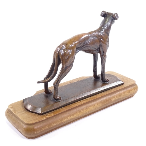 20 - A patinated bronze Greyhound, unsigned, probably early 20th century, on wooden plinth base, plinth l... 