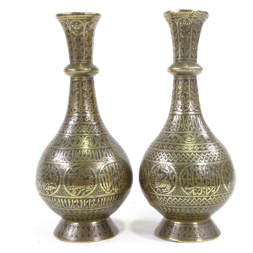 204 - A pair of heavy gauge Middle Eastern bronze narrow-necked vases, with engraved decoration, height 30... 