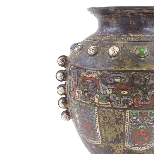 62 - A Chinese verdigris bronze and champleve enamel vase, with applied enamel bosses, height 34cm, rim d... 