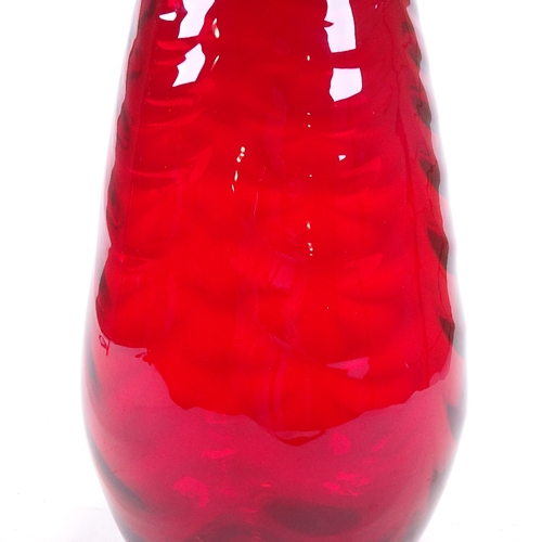 63 - A Whitefriars large ruby glass vase, swag design, height 30cm.