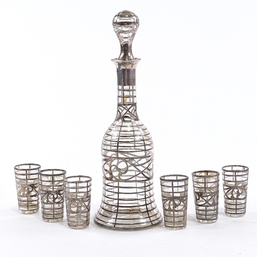 67 - An Edwardian silver overlay glass liqueur set in original fitted case, retailed by Weir & Sons, deca... 