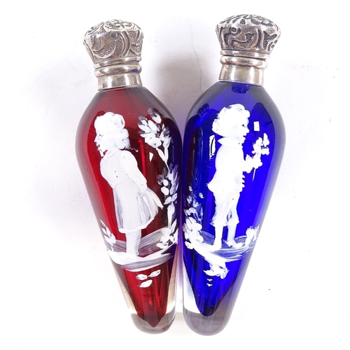 78 - A pair of Mary Gregory Bristol blue and ruby glass perfume bottles, with painted studies of children... 