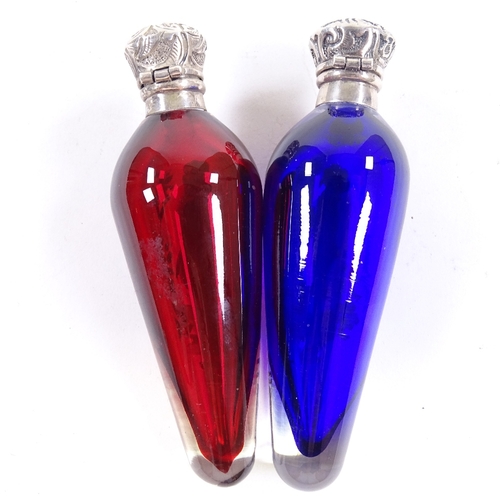 78 - A pair of Mary Gregory Bristol blue and ruby glass perfume bottles, with painted studies of children... 