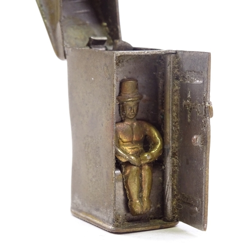 79 - A Victorian brass novelty Vesta case, in the form of a man sitting in a privy