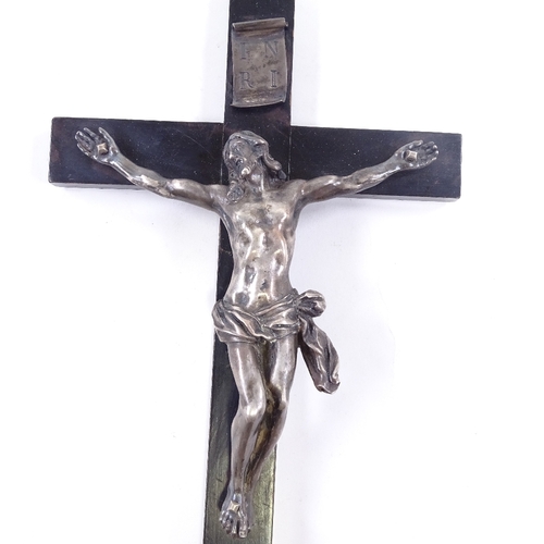 82 - An 18th/19th century Continental silver crucifix on ebonised wood cross, unmarked, height 28cm