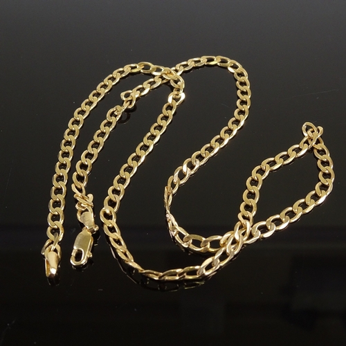 536 - A 9ct gold flat curb link chain necklace, necklace length 50cm, 9.4g