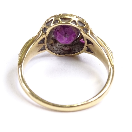 538 - A 19th century unmarked gold ruby and rose-cut diamond cluster ring, 11.6mm, size J, 31.g (2 rubies ... 