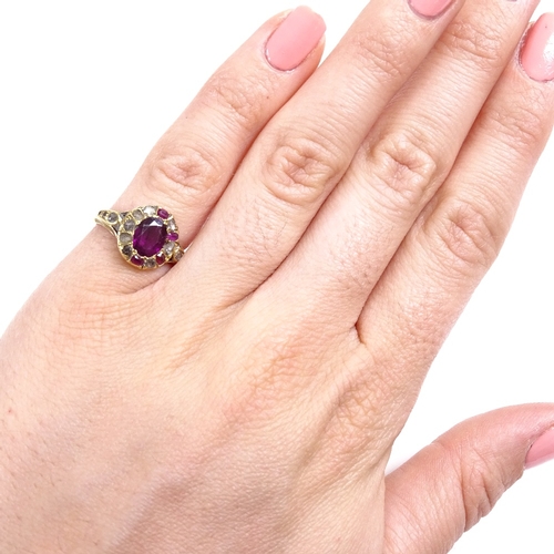 538 - A 19th century unmarked gold ruby and rose-cut diamond cluster ring, 11.6mm, size J, 31.g (2 rubies ... 