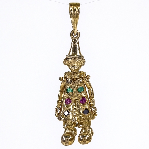 541 - A novelty 9ct gold gem set articulated figural clown pendant, set with emeralds, rubies and sapphire... 