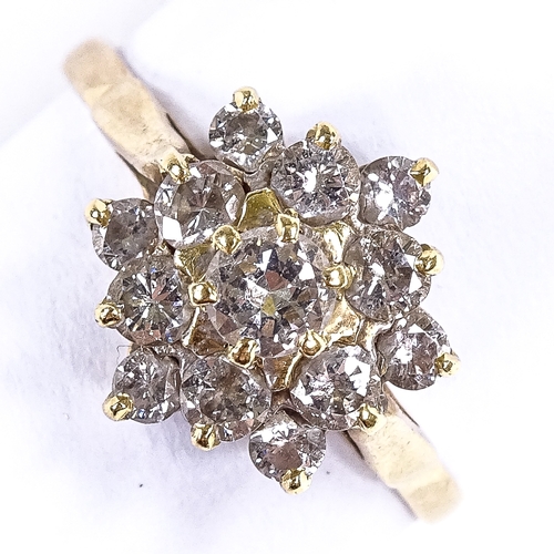 545 - A late 20th century 18ct gold diamond cluster snowflake dress ring, total diamond content approx 1ct... 