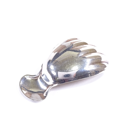 550 - An Elizabeth II silver hand-shaped tea caddy spoon, by Perry, Glossop & Co, hallmarks Sheffield 1986... 