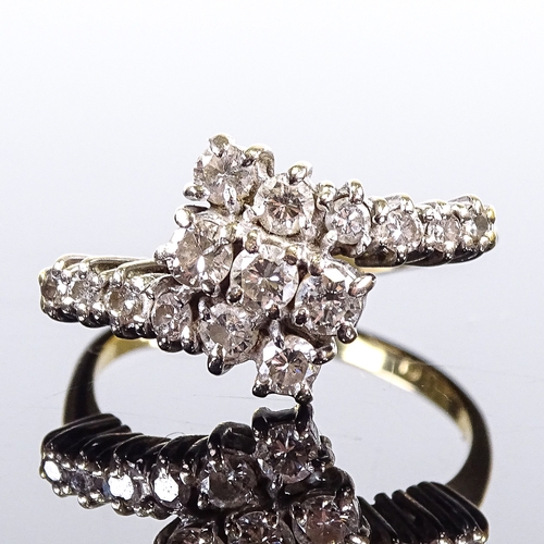 556 - An 18ct gold diamond cluster crossover dress ring, total diamond content approx 0.5ct, setting heigh... 