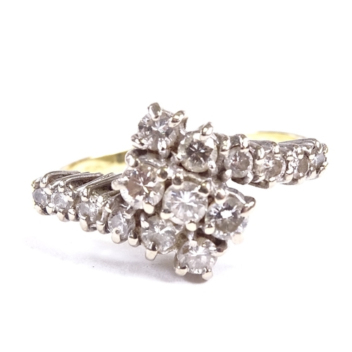 556 - An 18ct gold diamond cluster crossover dress ring, total diamond content approx 0.5ct, setting heigh... 