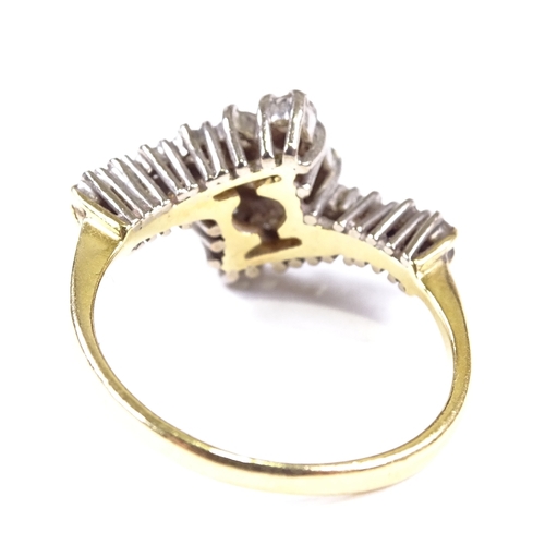 556 - An 18ct gold diamond cluster crossover dress ring, total diamond content approx 0.5ct, setting heigh... 