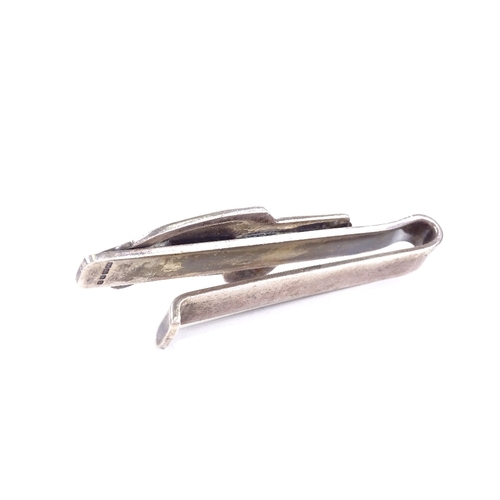 557 - *WITHDRAWN* A late 20th century silver Aston Martin car design tie clip, by Doubar Ltd, hallmarks Lo... 