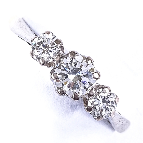 560 - An 18ct gold 3-stone diamond dress ring, total diamond content approx 0.8ct, size L, 2g