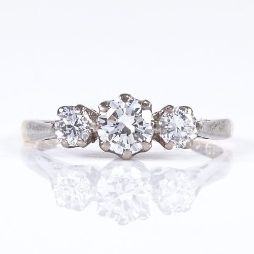 560 - An 18ct gold 3-stone diamond dress ring, total diamond content approx 0.8ct, size L, 2g