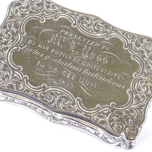 569 - A Victorian silver rectangular snuffbox, allover engraved foliate decoration with gilt interior, by ... 