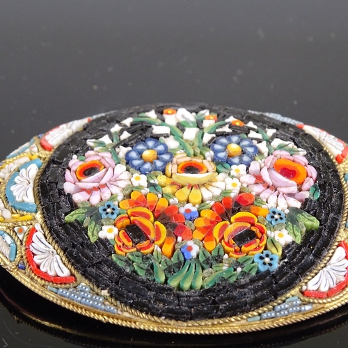 591 - An Italian micro-mosaic gilt-metal floral panel brooch, brooch length 65.1mm, 40.5g