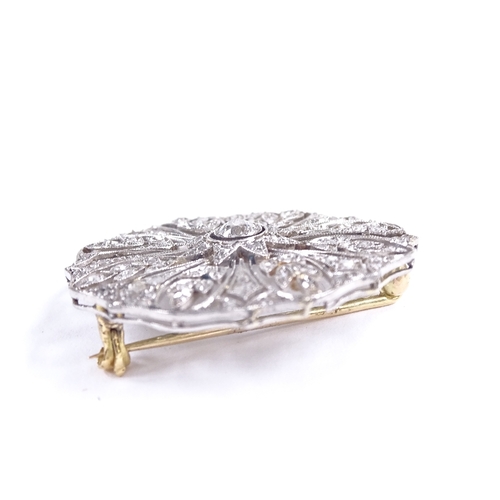 592 - A Belle Epoque unmarked platinum and diamond cluster floral brooch, pierced millegrain settings, set... 