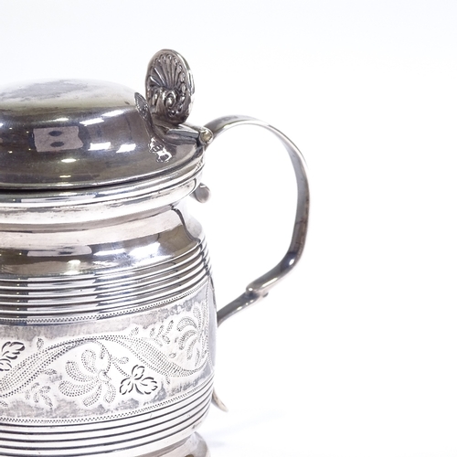 595 - A George III silver drum-shaped mustard pot, bright-cut engraved floral decoration with ribbed body,... 