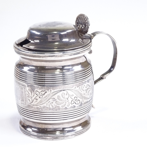 595 - A George III silver drum-shaped mustard pot, bright-cut engraved floral decoration with ribbed body,... 