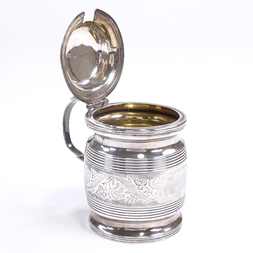 595 - A George III silver drum-shaped mustard pot, bright-cut engraved floral decoration with ribbed body,... 