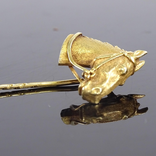 602 - A 14ct gold figural horsehead racing stick pin, realistically formed, overall length 65.1mm, 5.6g