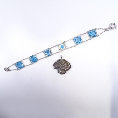 604 - An Arts and Crafts sterling silver and blue enamel panel bracelet, and a Continental silver and enam... 