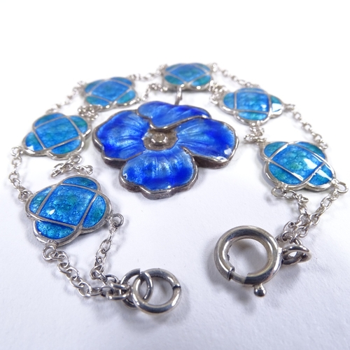 604 - An Arts and Crafts sterling silver and blue enamel panel bracelet, and a Continental silver and enam... 