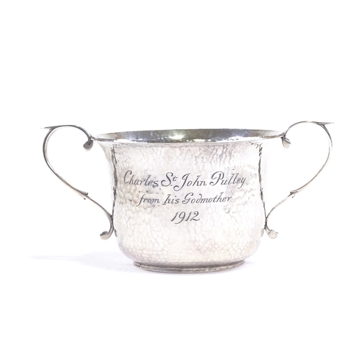 609 - A George V silver porringer, planished decoration with inscription to Charles St. John Pulley, by Go... 