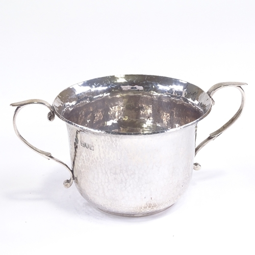 609 - A George V silver porringer, planished decoration with inscription to Charles St. John Pulley, by Go... 