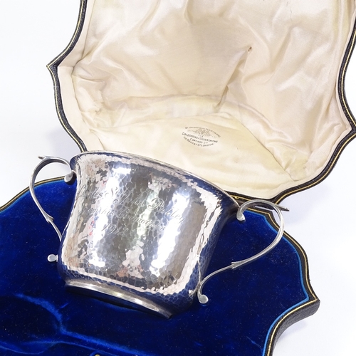 609 - A George V silver porringer, planished decoration with inscription to Charles St. John Pulley, by Go... 