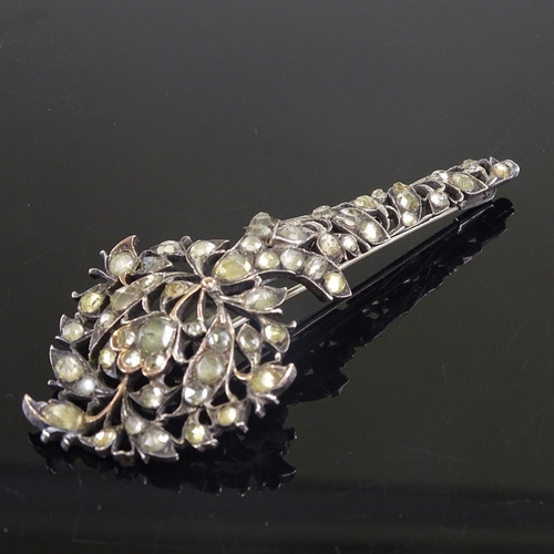 612 - A large Sri Lankan unmarked silver gold-topped paste floral spray brooch, brooch length 84.3mm, 20.1... 