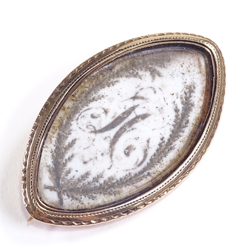 615 - A Georgian unmarked rose gold navette-shaped memorial mourning brooch, hand painted ivory panel with... 