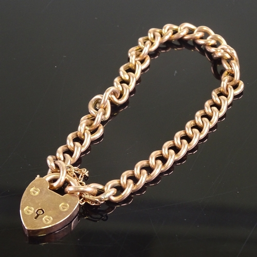 617 - A 9ct rose gold heart padlock charm bracelet, bracelet length 15cm, 10.8g