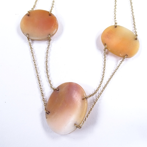 622 - A Victorian 3-panel relief carved cameo shell collar necklace, on later unmarked gold double-row cha... 