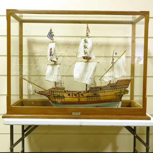 191 - A scratch-built wooden-hulled model of the Golden Hind, in large teak-framed display case, case leng... 