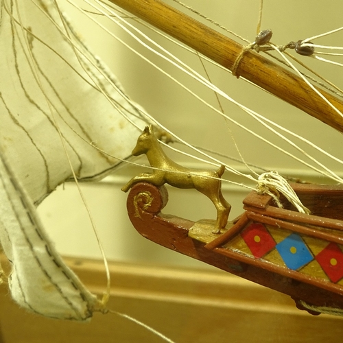 191 - A scratch-built wooden-hulled model of the Golden Hind, in large teak-framed display case, case leng... 