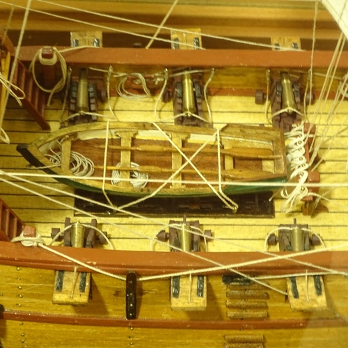 191 - A scratch-built wooden-hulled model of the Golden Hind, in large teak-framed display case, case leng... 