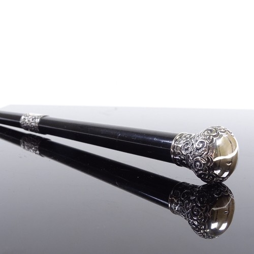 197 - An Edwardian conductor's baton, ebony with embossed sliver mounts, engraved 