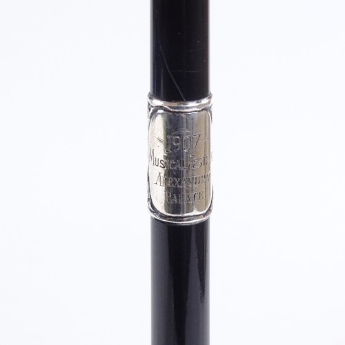 197 - An Edwardian conductor's baton, ebony with embossed sliver mounts, engraved 