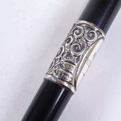 197 - An Edwardian conductor's baton, ebony with embossed sliver mounts, engraved 