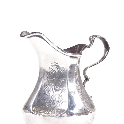 623 - A Victorian silver cream jug, bulbous form with foliate engraved dimpled panels and scrolled acanthu... 