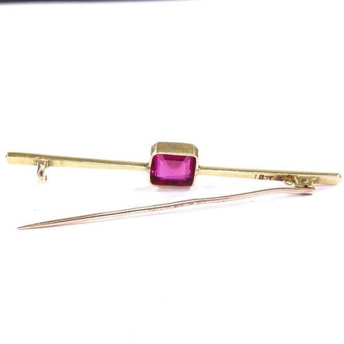 626 - An 18ct gold red stone bar brooch, brooch length 64.3mm, 4.8g