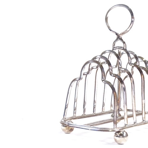 627 - An Edwardian silver 7-bar toast rack, by the Alexander Clark Manufacturing Co, hallmarks Birmingham ... 